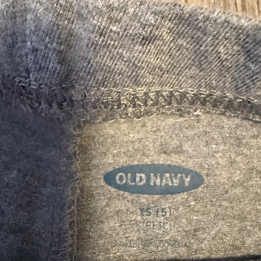 Two pair Old Navy Girls Grey and Navy Leggings with Blue Heart Detail